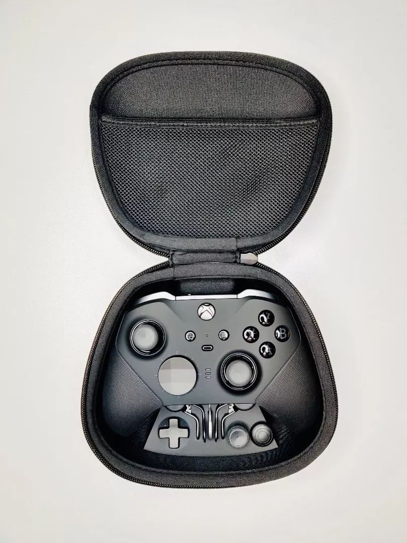 精英手柄自定义键位设置与游戏体验_手柄玩的格斗游戏_Xbox第二代精英手柄对比初代升级功能