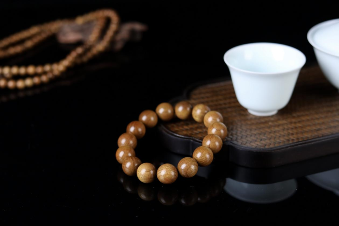 金丝楠木手串价格_金丝楠老料横切面图片_金丝楠木摆件寓意