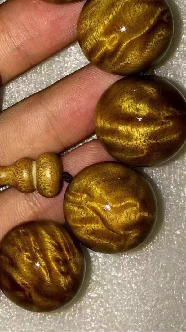 金丝楠老料横切面图片_金丝楠手串龙胆纹鉴别_金丝楠木特性与价值