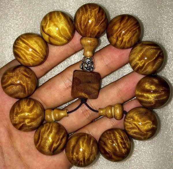 金丝楠老料横切面图片_金丝楠木特性与价值_金丝楠手串龙胆纹鉴别