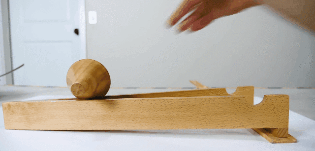 双锥体悖论_锥体上坡现象_锥体上滚生活应用